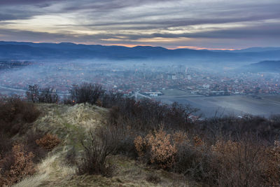 High angle view of cityscape against sky during sunset