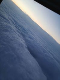 Aerial view of cloudscape against sky during sunset