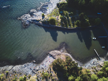 High angle view of rocks by sea