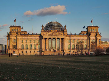 Group of people in front of historical building