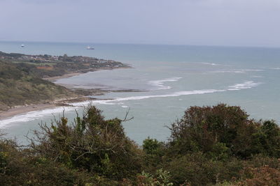 Scenic view of beach against clear sky