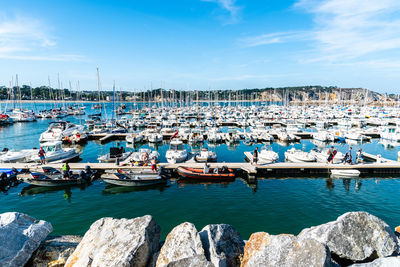 The marina of morgat a sunny day of summer with many smalls boats aligned in the piers