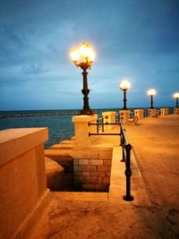 High angle view of illuminated street light against sky