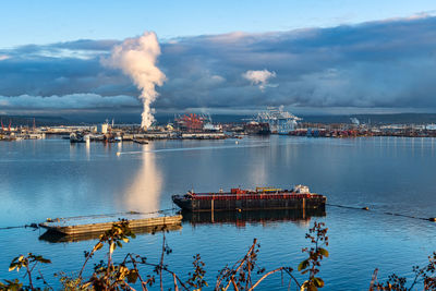 Steam rises at the port of tacoma in washington state.