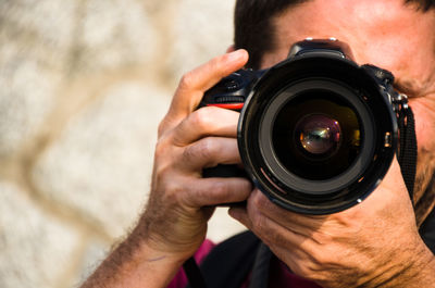 Midsection of man photographing