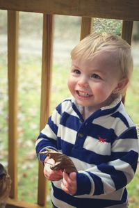 Portrait of cute boy in autumn 