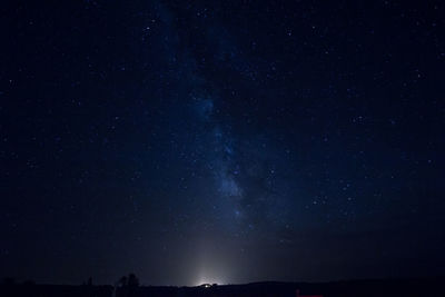 Low angle view of stars in sky at night