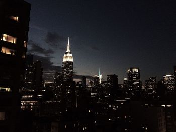 Illuminated cityscape at night