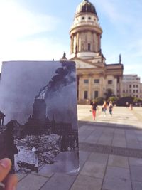 People in front of historical building