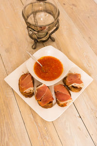 High angle view of breakfast served on table