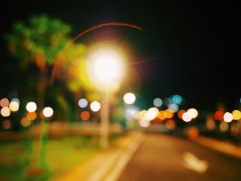 Illuminated street lights at night