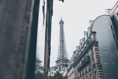 Low angle view of buildings in city against sky