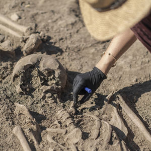 High angle view of man working on sand