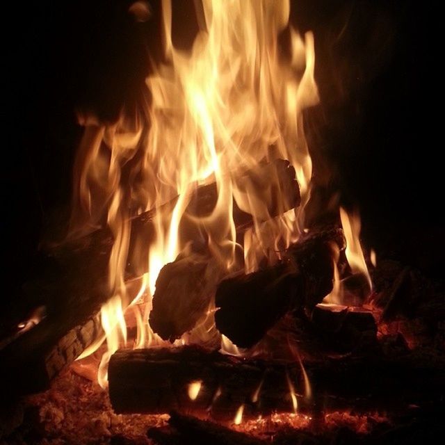 burning, flame, fire - natural phenomenon, heat - temperature, firewood, bonfire, glowing, night, fire, campfire, heat, motion, close-up, log, wood - material, fireplace, dark, illuminated, orange color, light - natural phenomenon