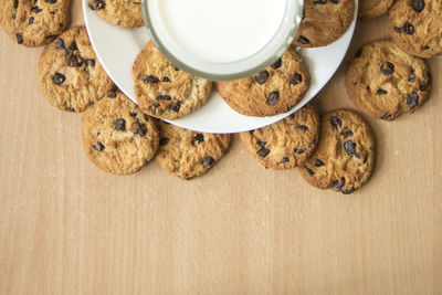 High angle view of cookies and coffee on table