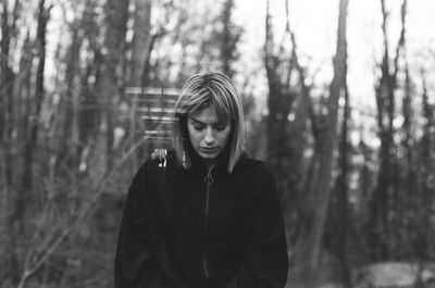 Portrait of a young woman in forest