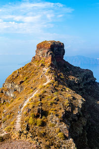 Rock formation on land against sky