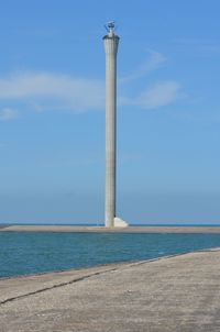 Scenic view of sea against blue sky