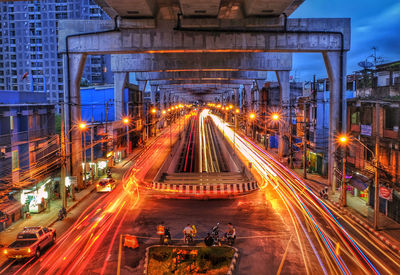 High angle view of light trails on road at night