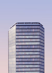 Low angle view of modern building against clear sky