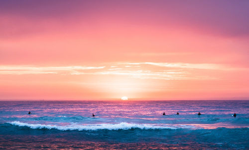 Scenic view of sea against sky during sunset