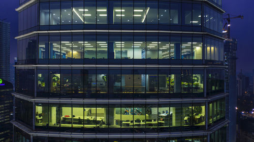 Low angle view of illuminated building at night