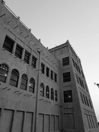 Low angle view of old building against clear sky