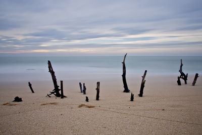 Panoramic view of beach against sky during sunset