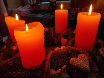 Close-up of illuminated tea light candle