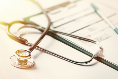 Close-up of stethoscope on paper