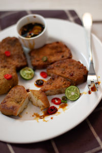 Close-up of breakfast served on table