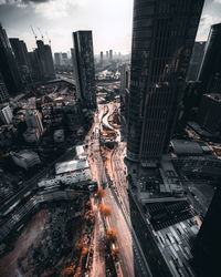 High angle view of street amidst buildings in city