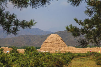 Stone wall with mountain range in background
