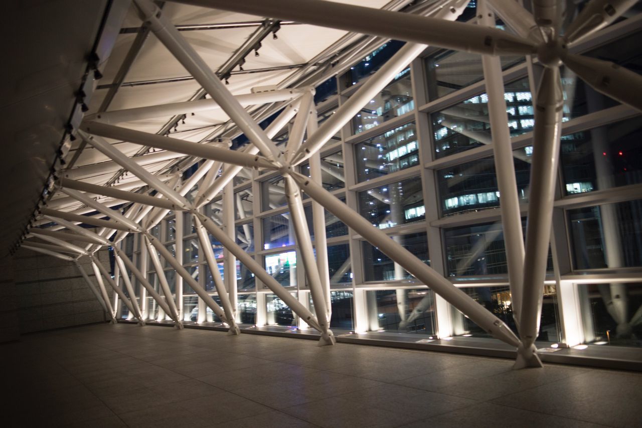 LOW ANGLE VIEW OF ILLUMINATED STAIRCASE IN BUILDING