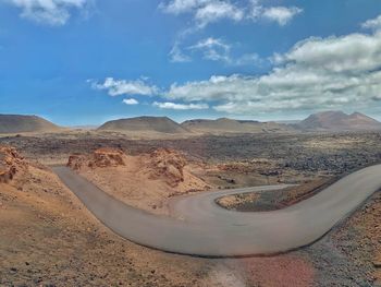 Scenic view of desert against sky