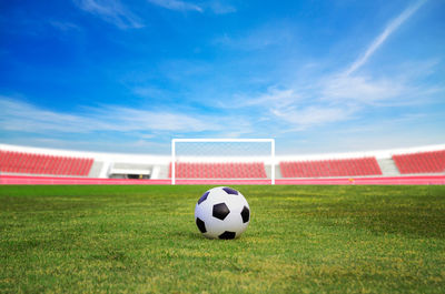 Close-up of soccer ball on field