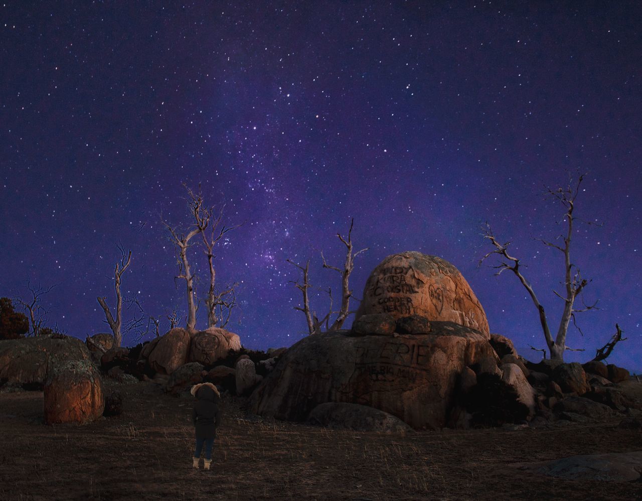 sky, rock, night, rock - object, solid, rock formation, star - space, space, nature, real people, beauty in nature, land, full length, standing, scenics - nature, men, one person, leisure activity, astronomy, outdoors