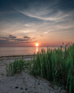 Scenic view of sea against sky during sunset