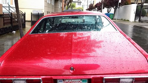 Close-up of car in city