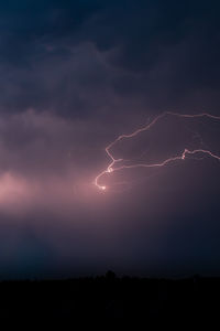 Scenic view of lightning in sky at night