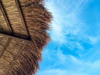 Low angle view of roof against sky