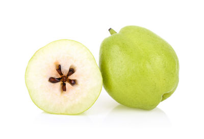 Close-up of pear against white background