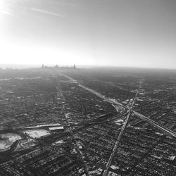 Aerial view of cityscape against sky