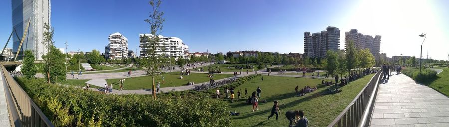 Panoramic view of park and buildings against sky