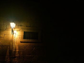 Illuminated lamp at night