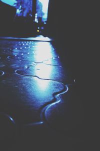 Illuminated fountain at night