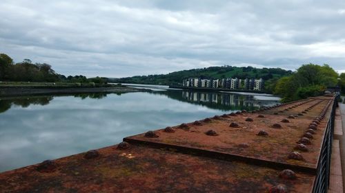 Bridge over river against sky