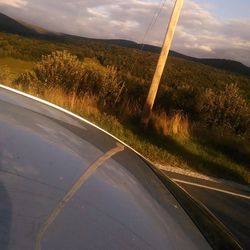 Country road passing through field