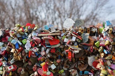 Close-up of padlocks hanging on railing