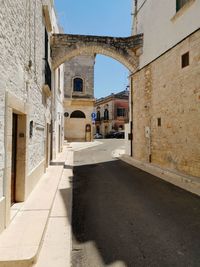 Alley amidst buildings in historic city center, southern italy 